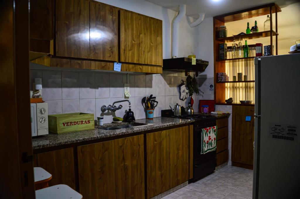 Kuchyň nebo kuchyňský kout v ubytování Hostel De La Tana