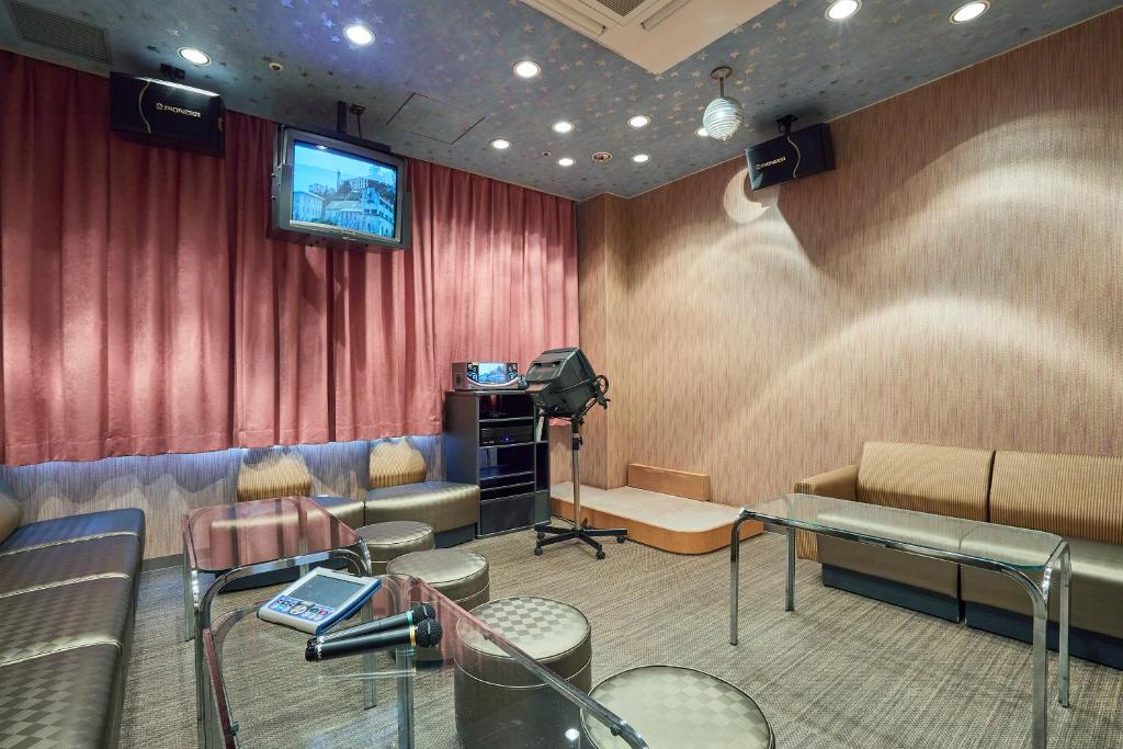 TV a/nebo společenská místnost v ubytování KAMENOI HOTEL Fukui