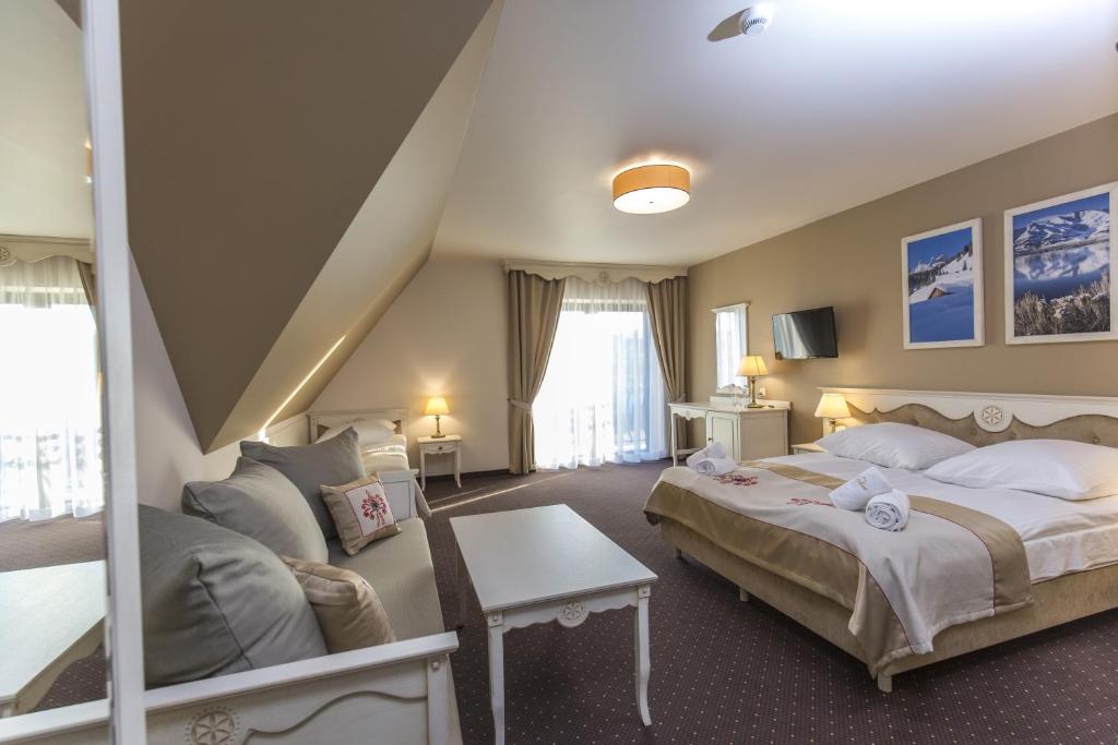 Posteľ alebo postele v izbe v ubytovaní Carlina Hotel & SPA