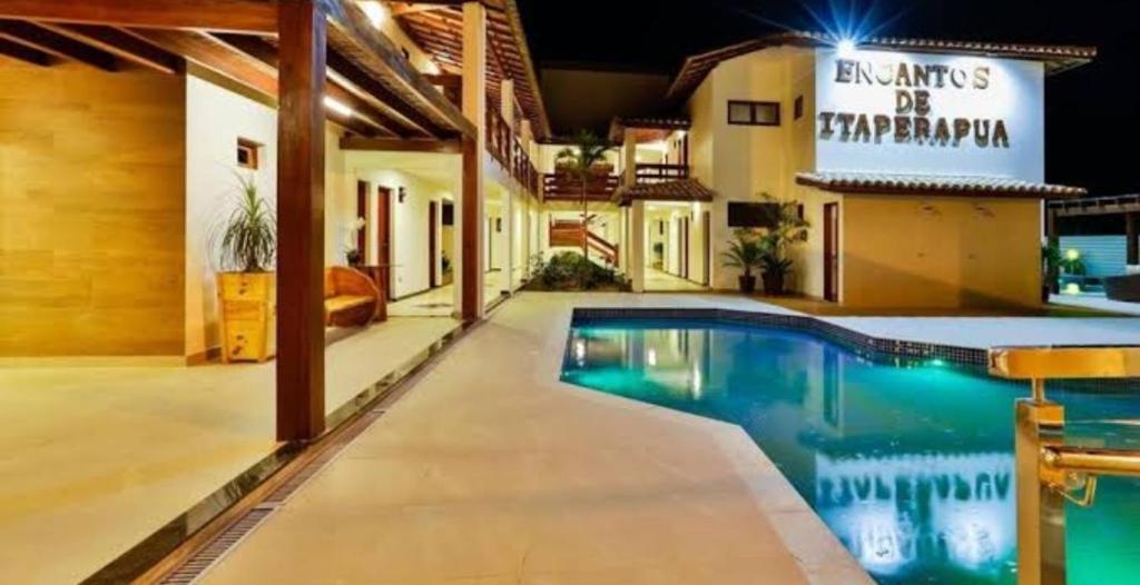 Πισίνα στο ή κοντά στο Encantos de itaperapuã