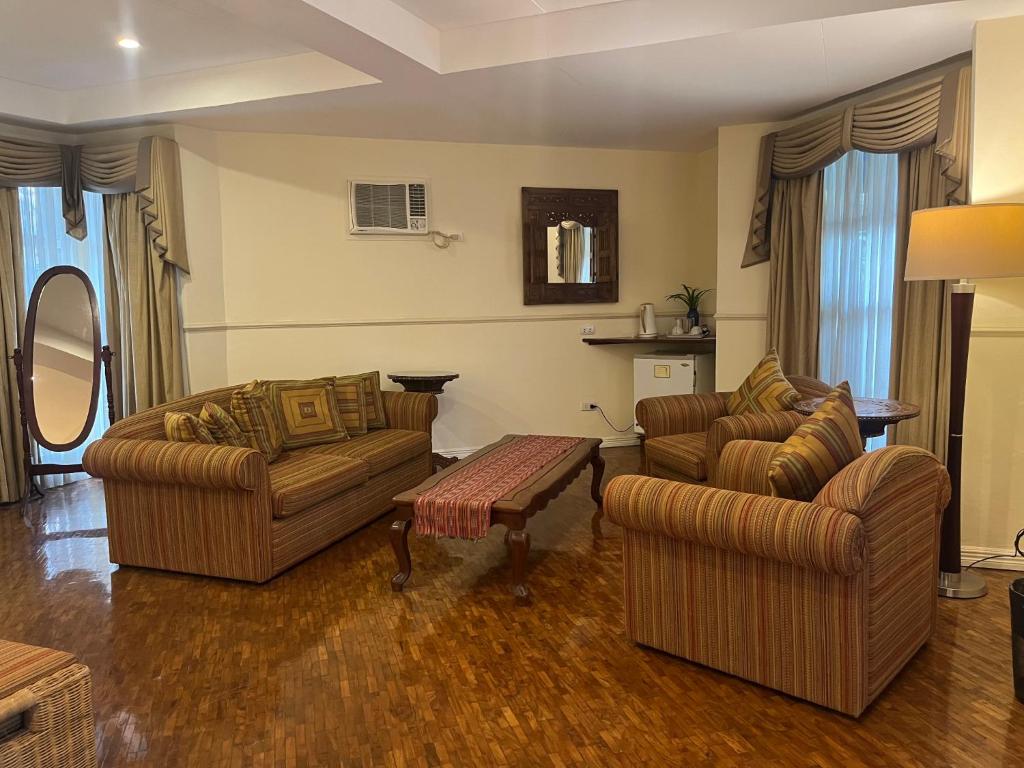 Posezení v ubytování Coco Grande Hotel