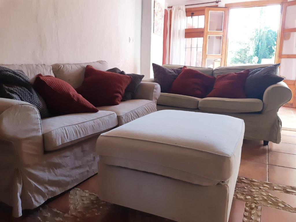 A seating area at Bonita Casa Rural en la Sierra de Aracena