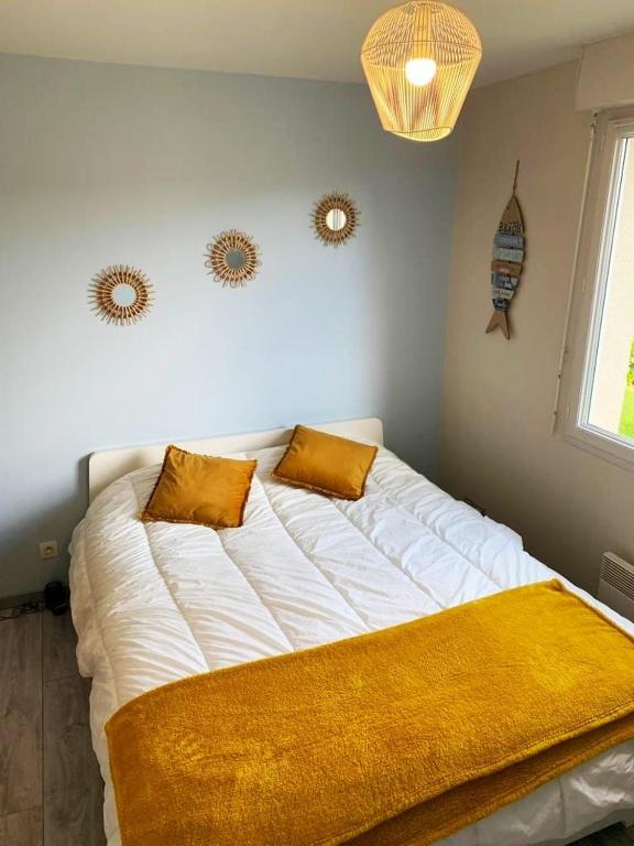 Posteľ alebo postele v izbe v ubytovaní Agréable maison moderne, entre campagne et mer !