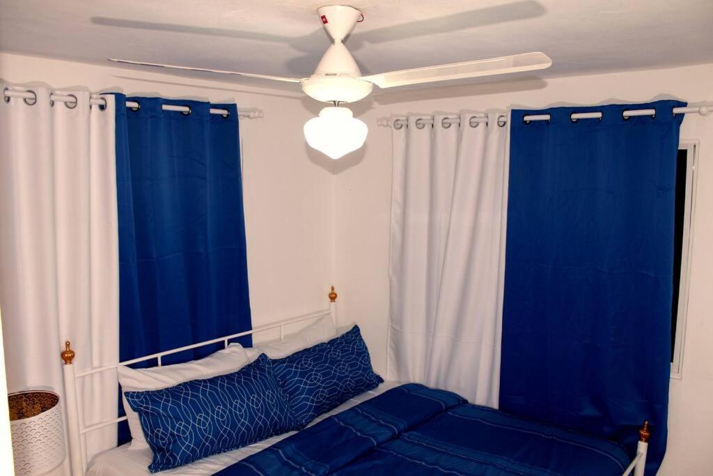 Postel nebo postele na pokoji v ubytování Dominican Suite 12, Incredible 2 Bed Apt (DS12)