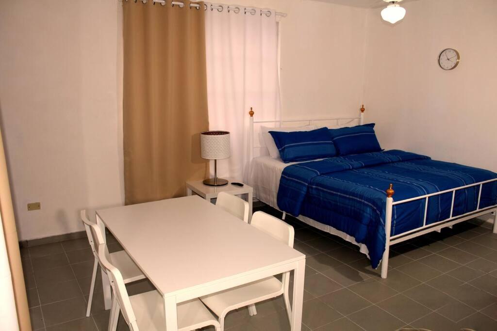 Ένα ή περισσότερα κρεβάτια σε δωμάτιο στο Dominican Suite 11, Amazing Apt/Studio (DS11)