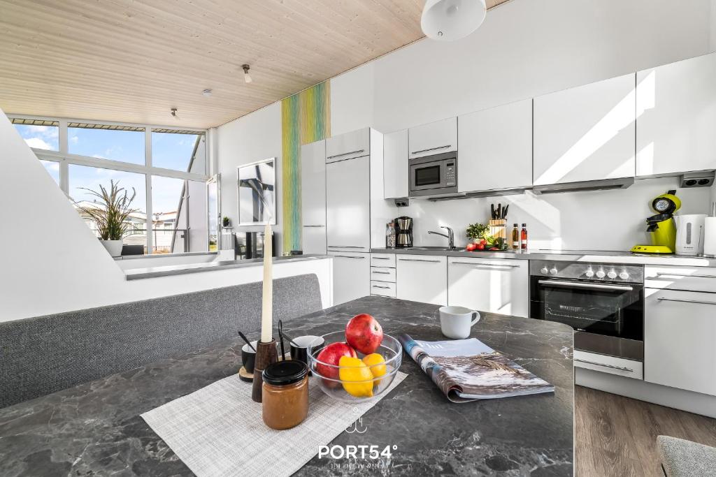 Kuchyň nebo kuchyňský kout v ubytování Ferienhaus Strandperle Marina Wendtorf