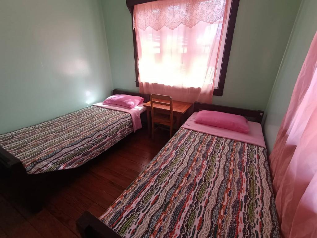 Postel nebo postele na pokoji v ubytování Sagada Guesthouse