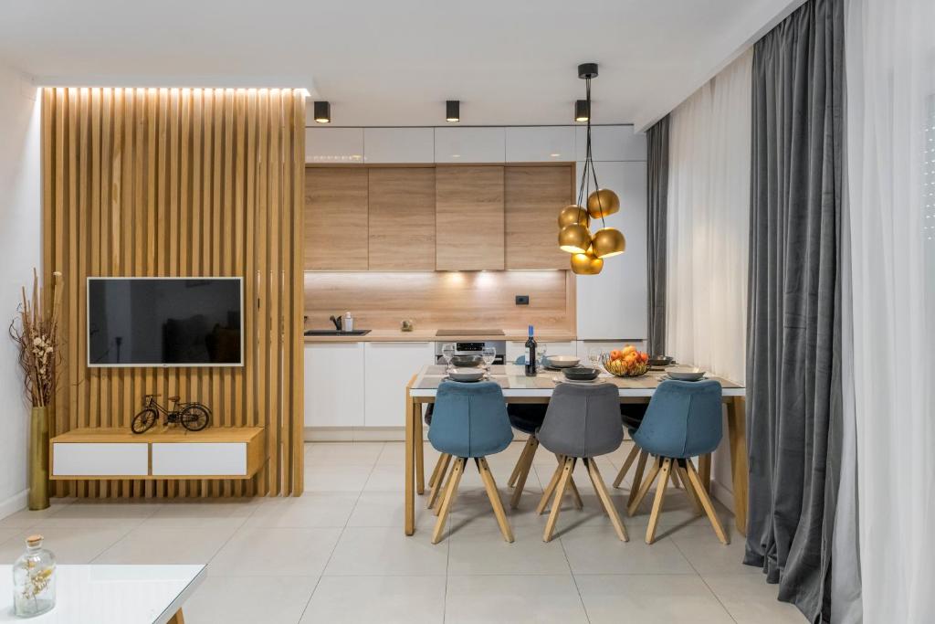 Kuchyň nebo kuchyňský kout v ubytování New Deluxe jacuzzi apartment Ana