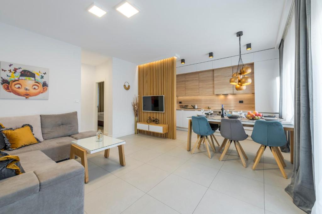 Kuchyň nebo kuchyňský kout v ubytování New Deluxe jacuzzi apartment Ana
