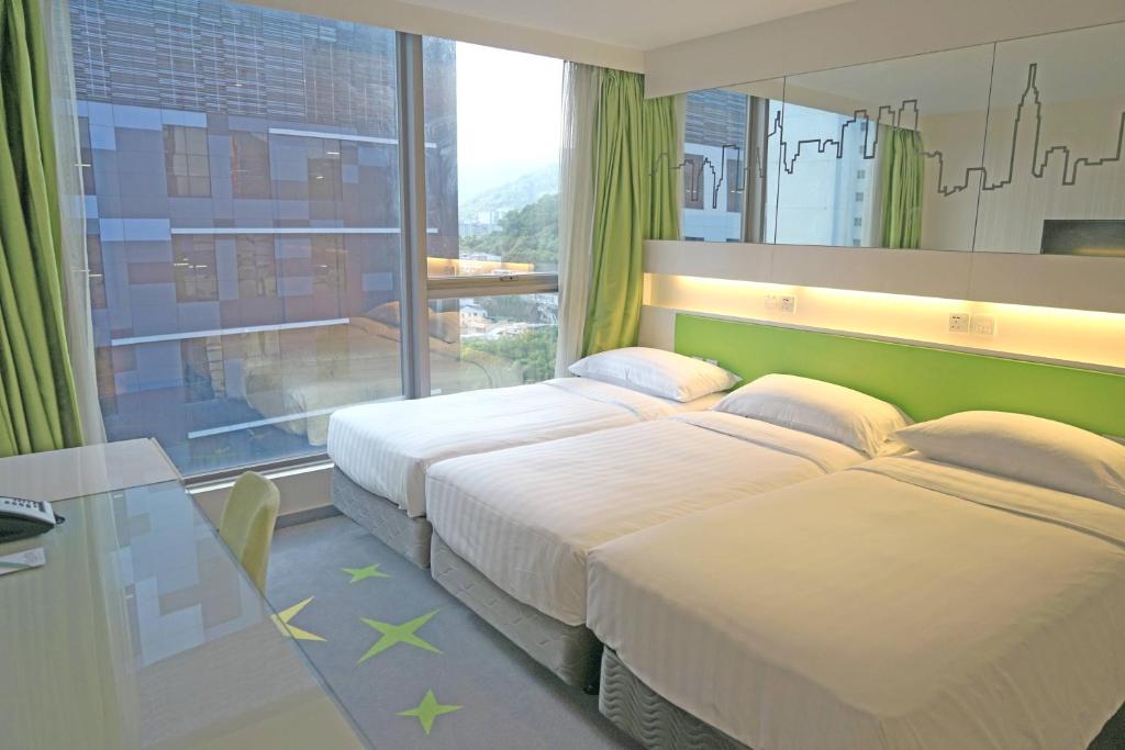 Voodi või voodid majutusasutuse Dorsett Tsuen Wan, Hong Kong toas