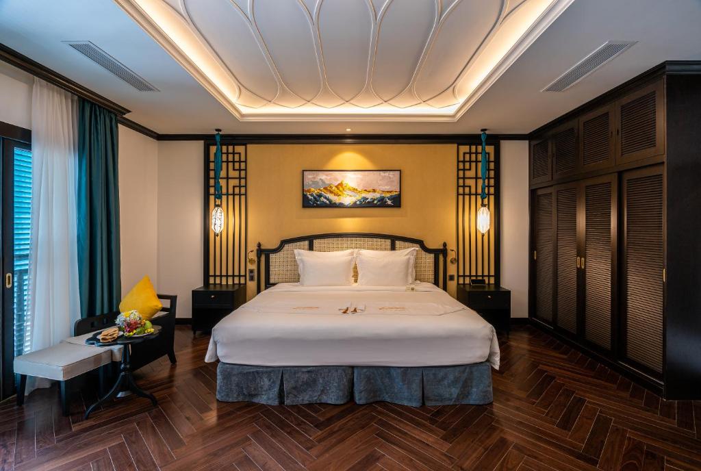 Giường trong phòng chung tại Potique Hotel