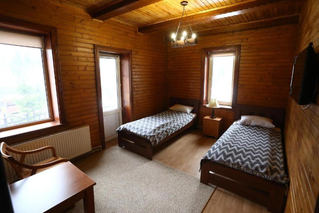 Postel nebo postele na pokoji v ubytování Pigy