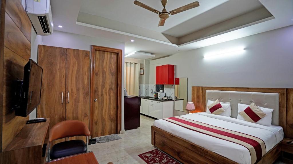 Postel nebo postele na pokoji v ubytování The Palm Suites - Medicity