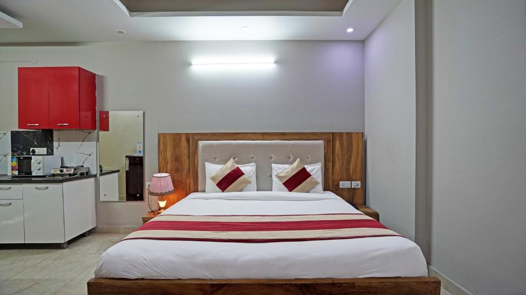 Kuchyň nebo kuchyňský kout v ubytování The Palm Suites - Medicity