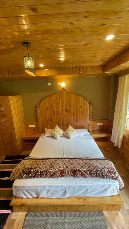 Postel nebo postele na pokoji v ubytování The Village View Homestay