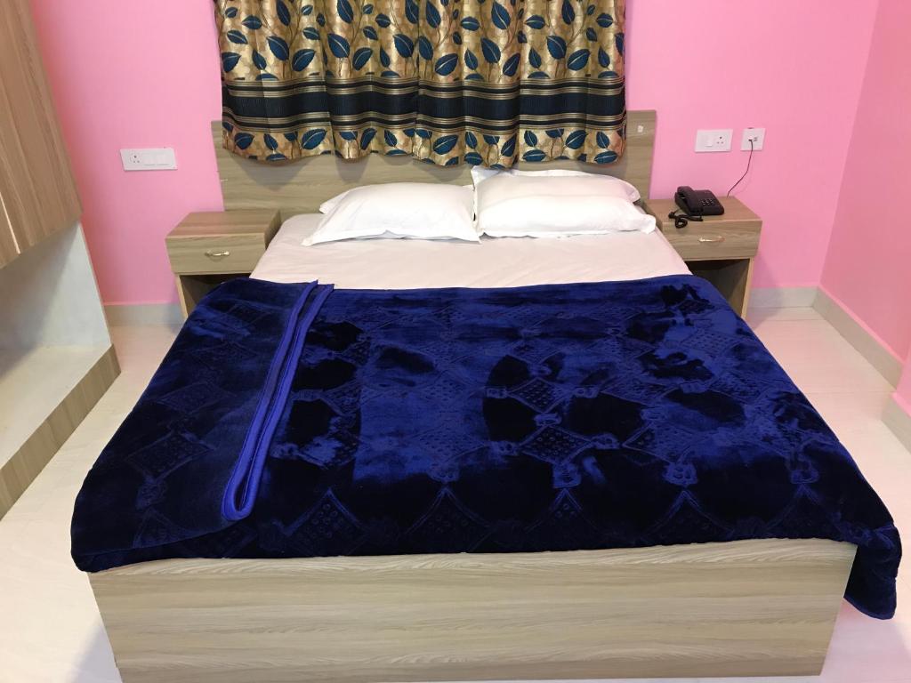 Postel nebo postele na pokoji v ubytování HAPPYSTAY rooms and cottages