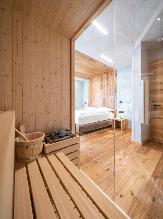 Ένα ή περισσότερα κρεβάτια σε δωμάτιο στο Hotel Larice