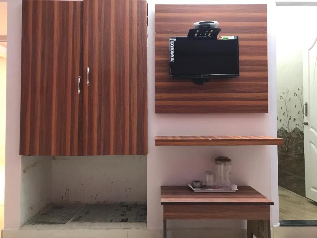 TV a/nebo společenská místnost v ubytování HAPPYSTAY rooms and cottages