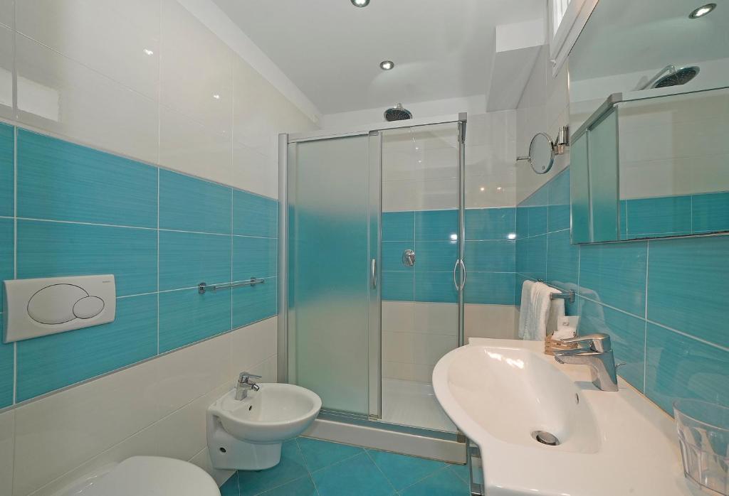 Koupelna v ubytování Hotel Strand a frontemare