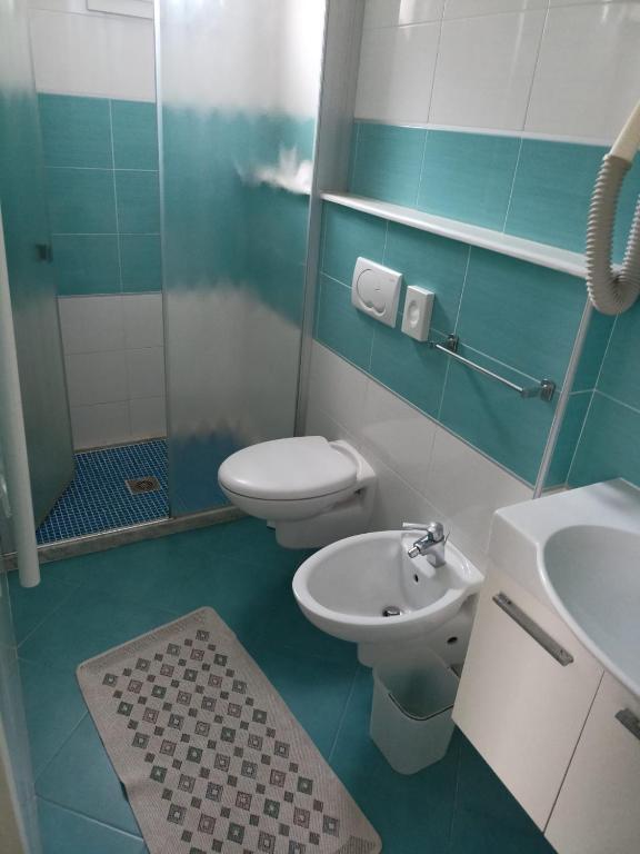 Koupelna v ubytování Hotel Strand a frontemare