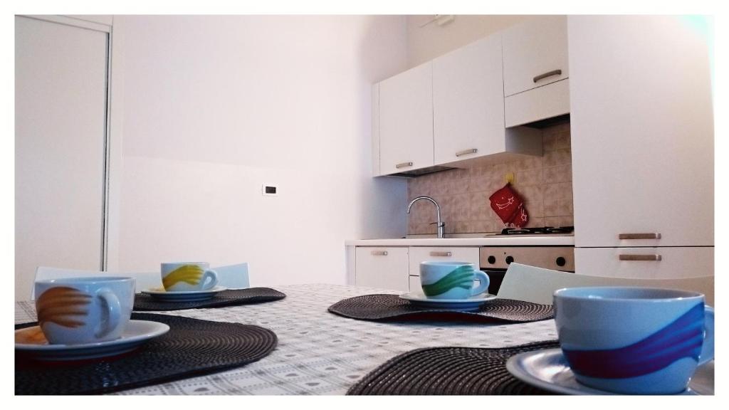 A kitchen or kitchenette at LOFT Il "Nido degli Angeli"