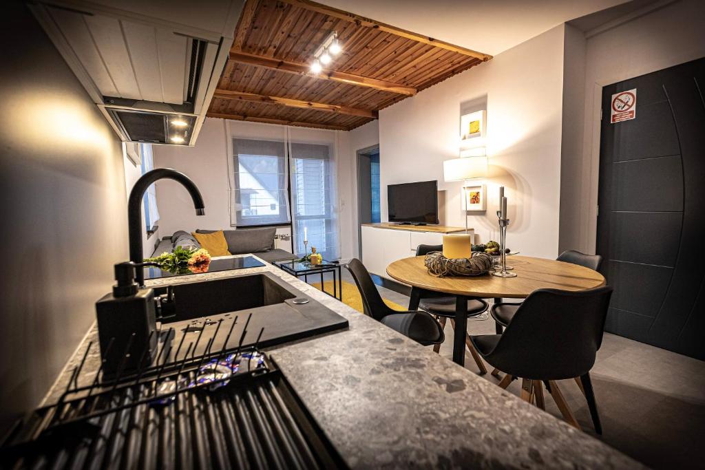 Posedenie v ubytovaní Apartamenty MIODZIO