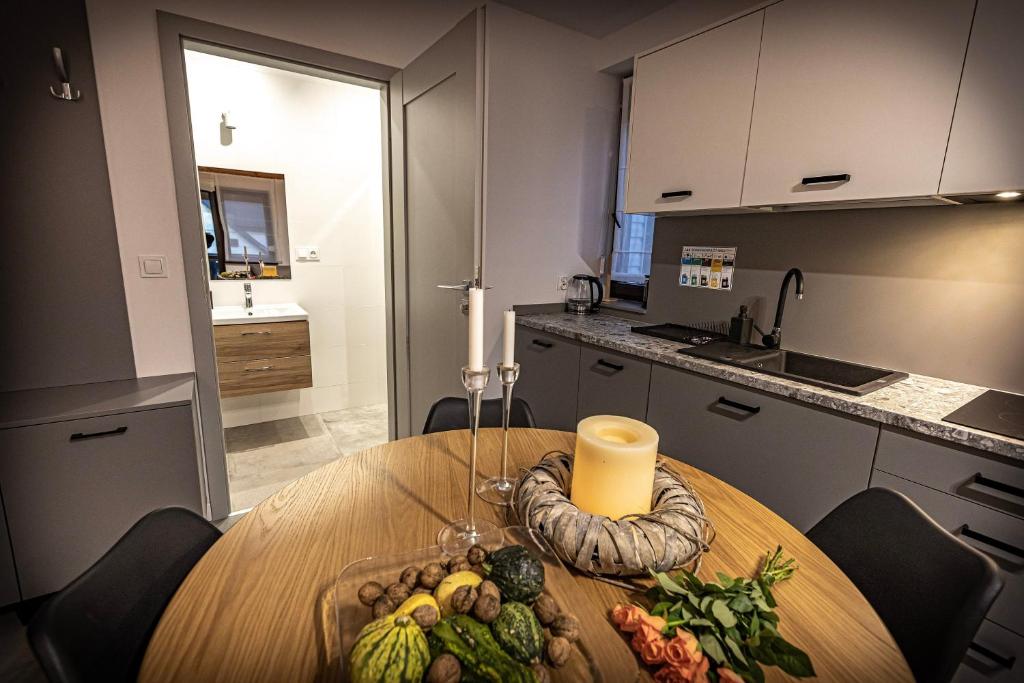 Kuchyňa alebo kuchynka v ubytovaní Apartamenty MIODZIO