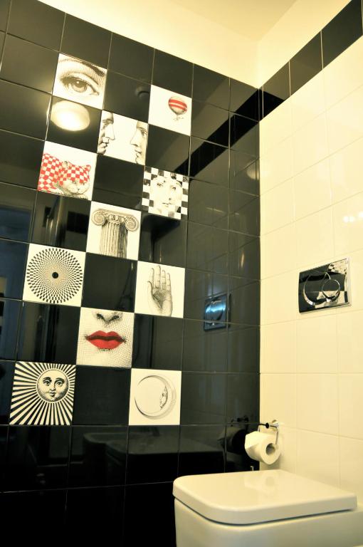 A bathroom at Feliz in Roma B&B