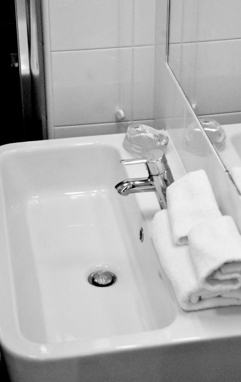 A bathroom at Feliz in Roma B&B