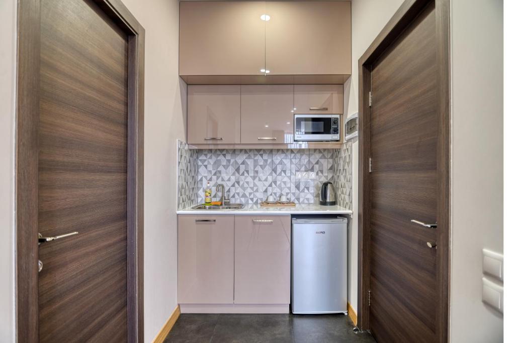 Kuchyň nebo kuchyňský kout v ubytování Orbeli Hotel Yerevan
