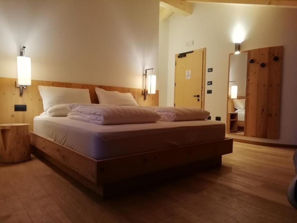 Postel nebo postele na pokoji v ubytování B&B Fontanella