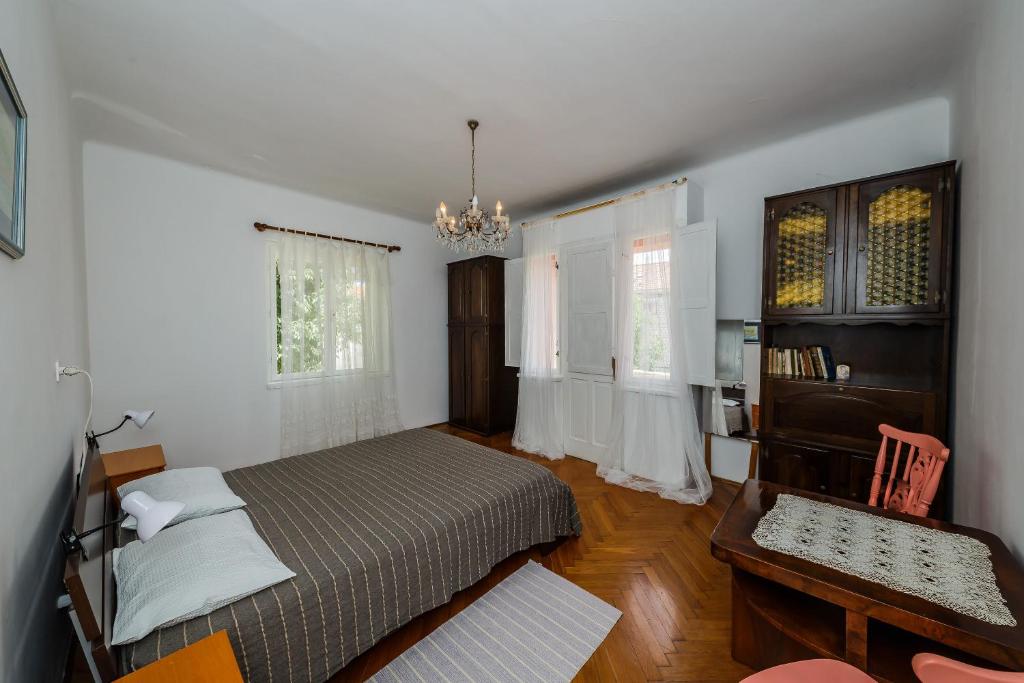 Postel nebo postele na pokoji v ubytování Apartments Jelen