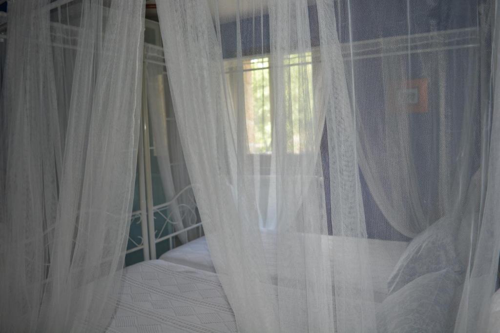 A bed or beds in a room at el calero