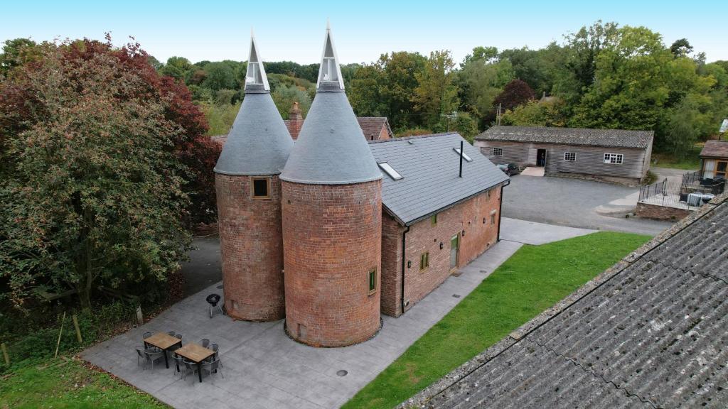 an aerial view of a castle with two towers at The Hophouse in Hereford
