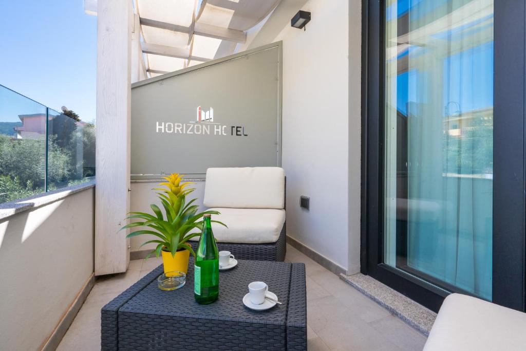 Posezení v ubytování Horizon Hotel Badesi