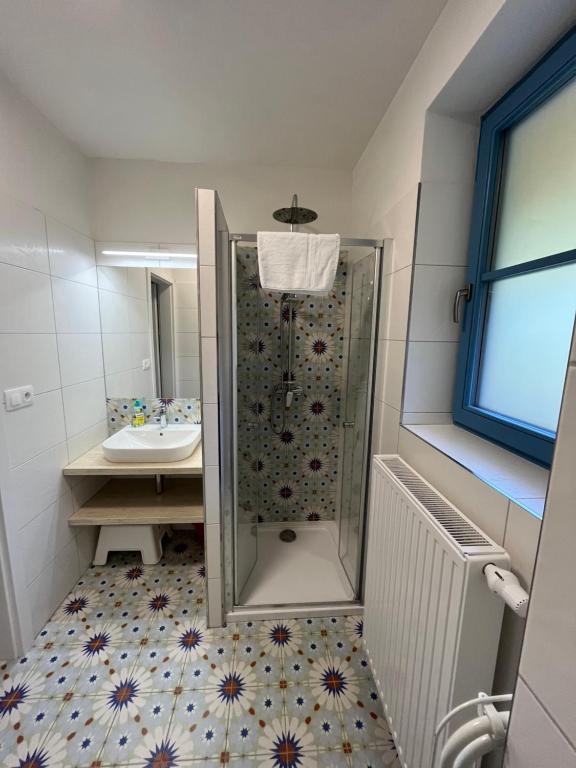 Koupelna v ubytování Hotel Edvard