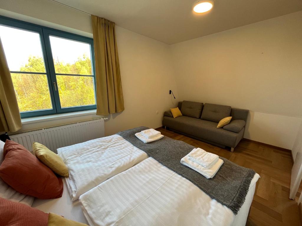 Postel nebo postele na pokoji v ubytování Hotel Edvard