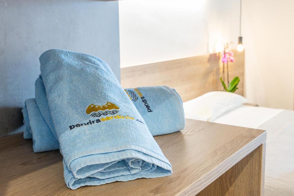 Postel nebo postele na pokoji v ubytování Horizon Hotel Badesi
