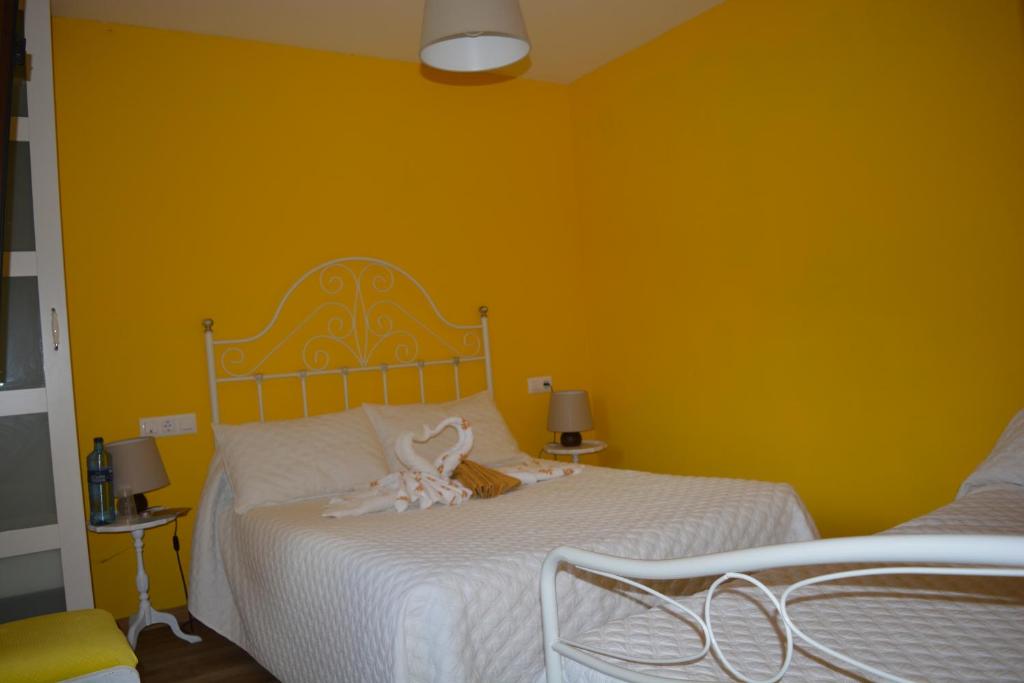 A bed or beds in a room at el calero
