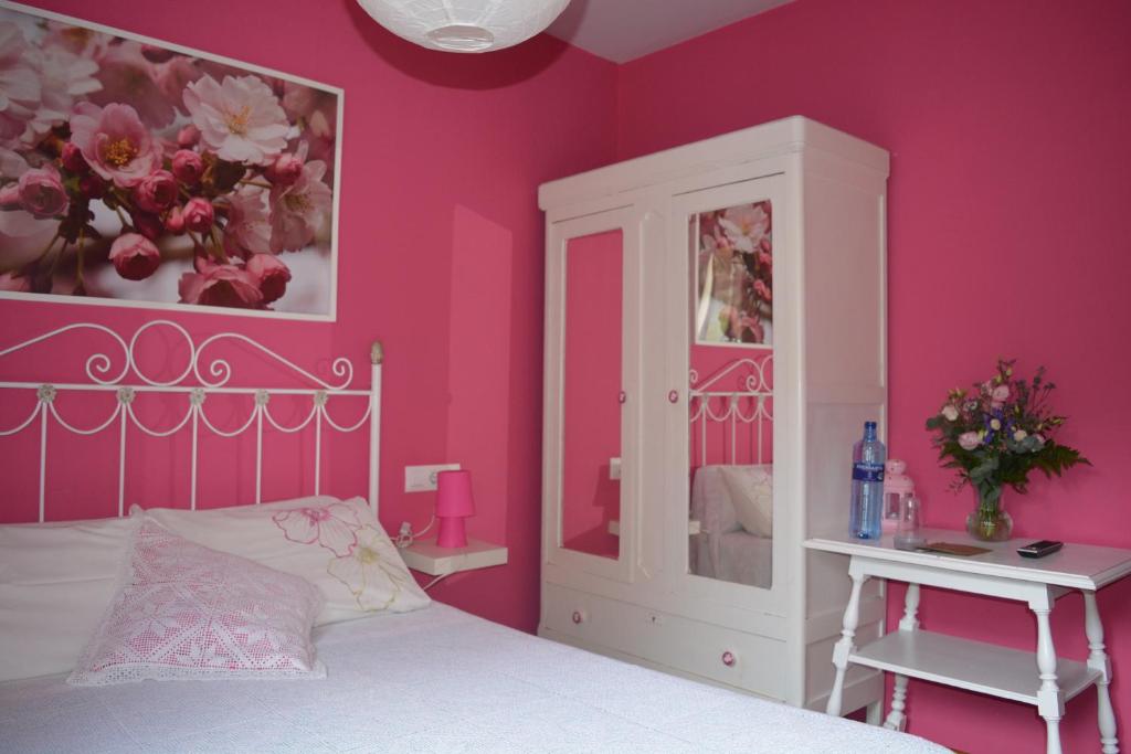 A bed or beds in a room at el calero