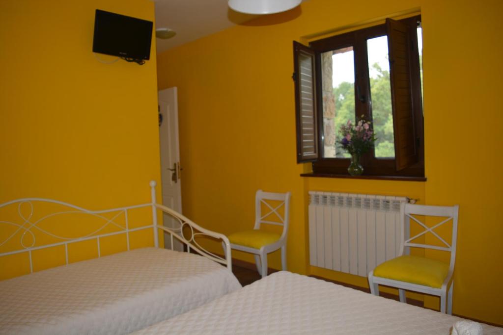 A bed or beds in a room at el calero