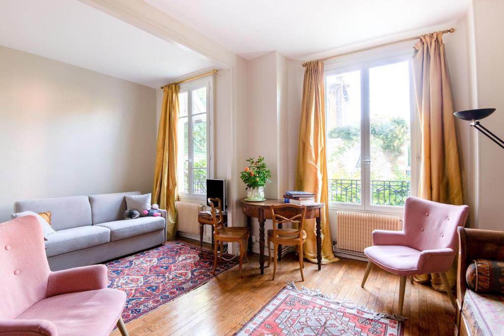 Zona d'estar a Le Monarque - Appartement avec jardin