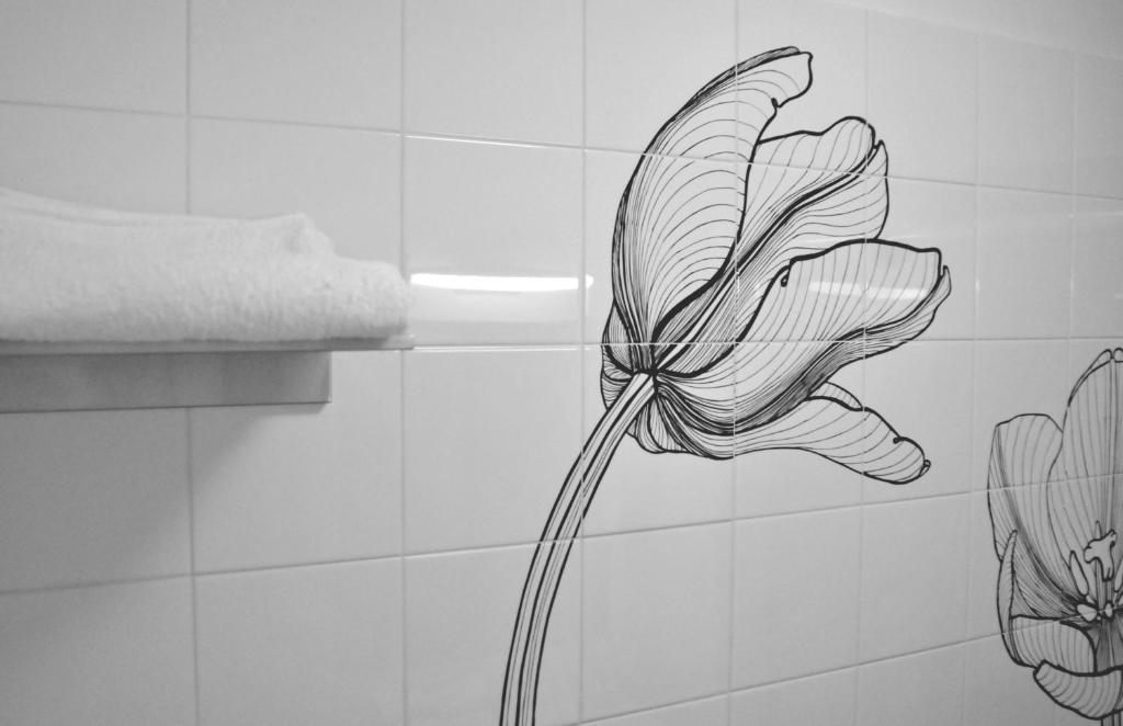 A bathroom at Feliz in Roma B&B