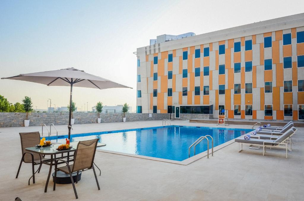 لابی و فضای عمومی VOGO Grand Hotel Formerly Best Western Plus Hotel Dubai Academic City - تصویر ۵
