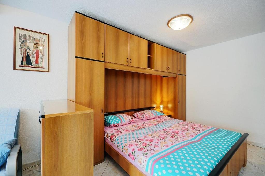 Postel nebo postele na pokoji v ubytování Apartments Marica