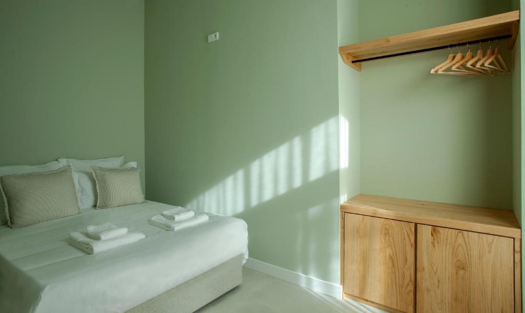 Postel nebo postele na pokoji v ubytování Casa Margô