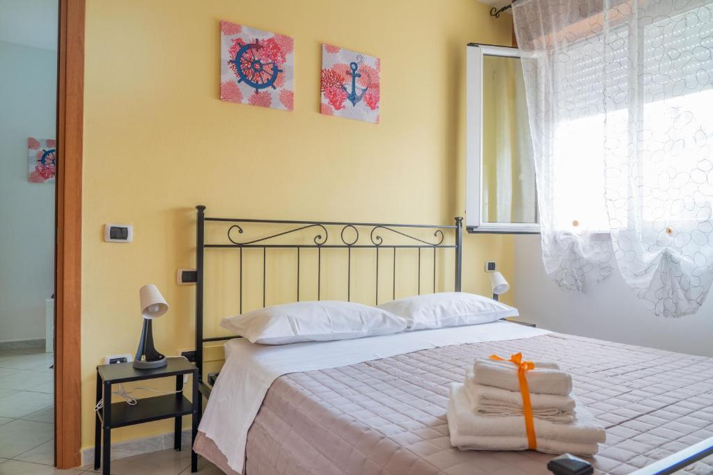 Łóżko lub łóżka w pokoju w obiekcie Residence Yellow