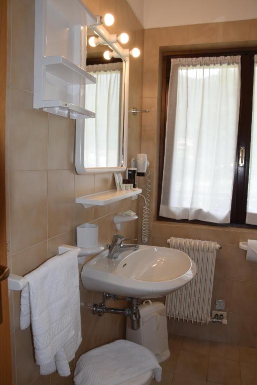 Koupelna v ubytování Hotel Ferrari
