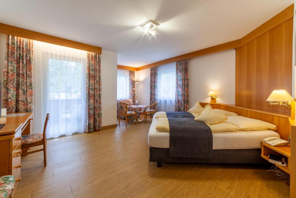 Postel nebo postele na pokoji v ubytování Frühstücks-Hotel Olympia