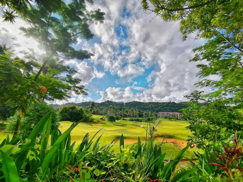 a view of a golf course with a green at Fairways and Bluewater Boracay in Boracay